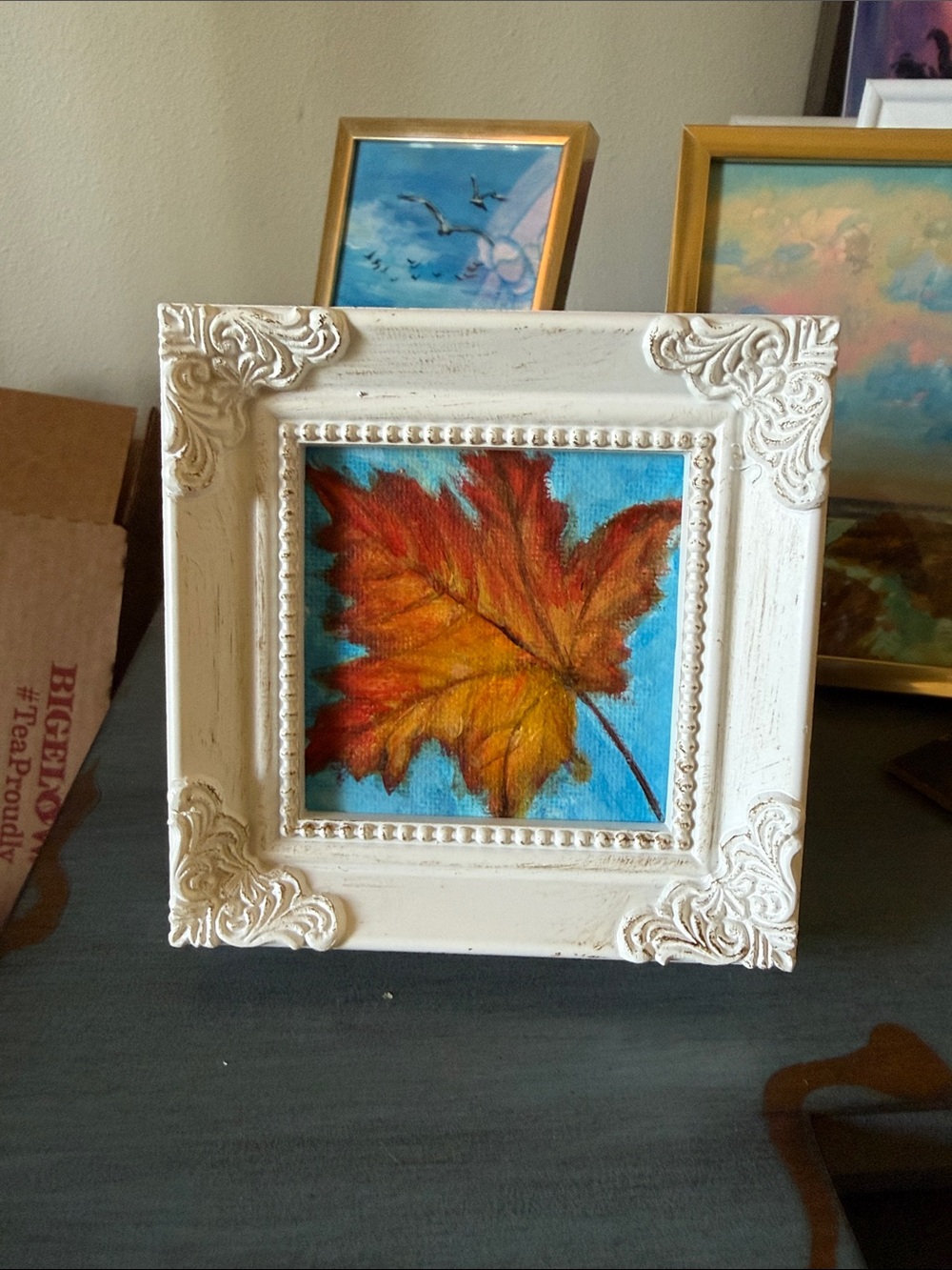 White Ornate Frame Wall Art with Autumn Leaf Print